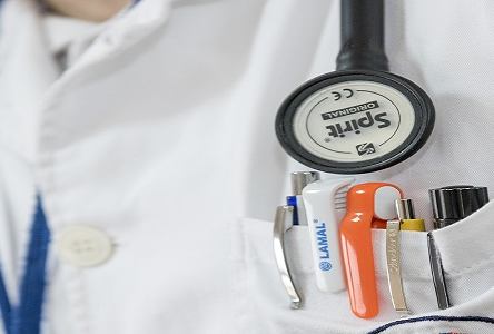 A nurse with pens in the pocket